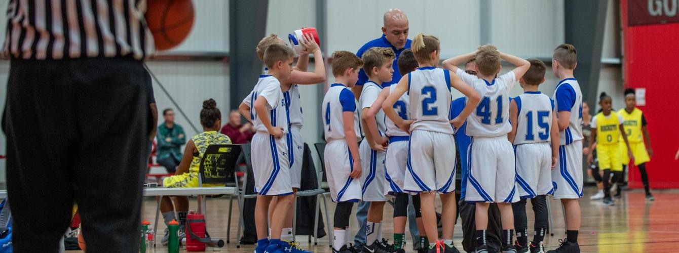 East Supreme team huddle