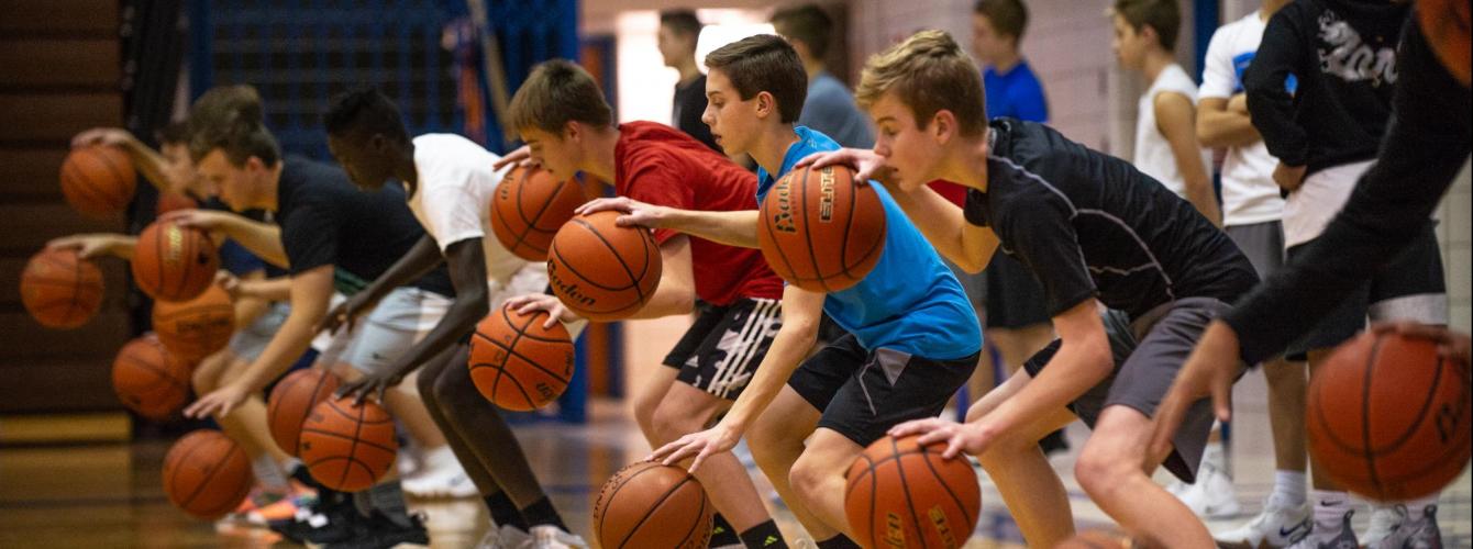 Players dribbling at clinic