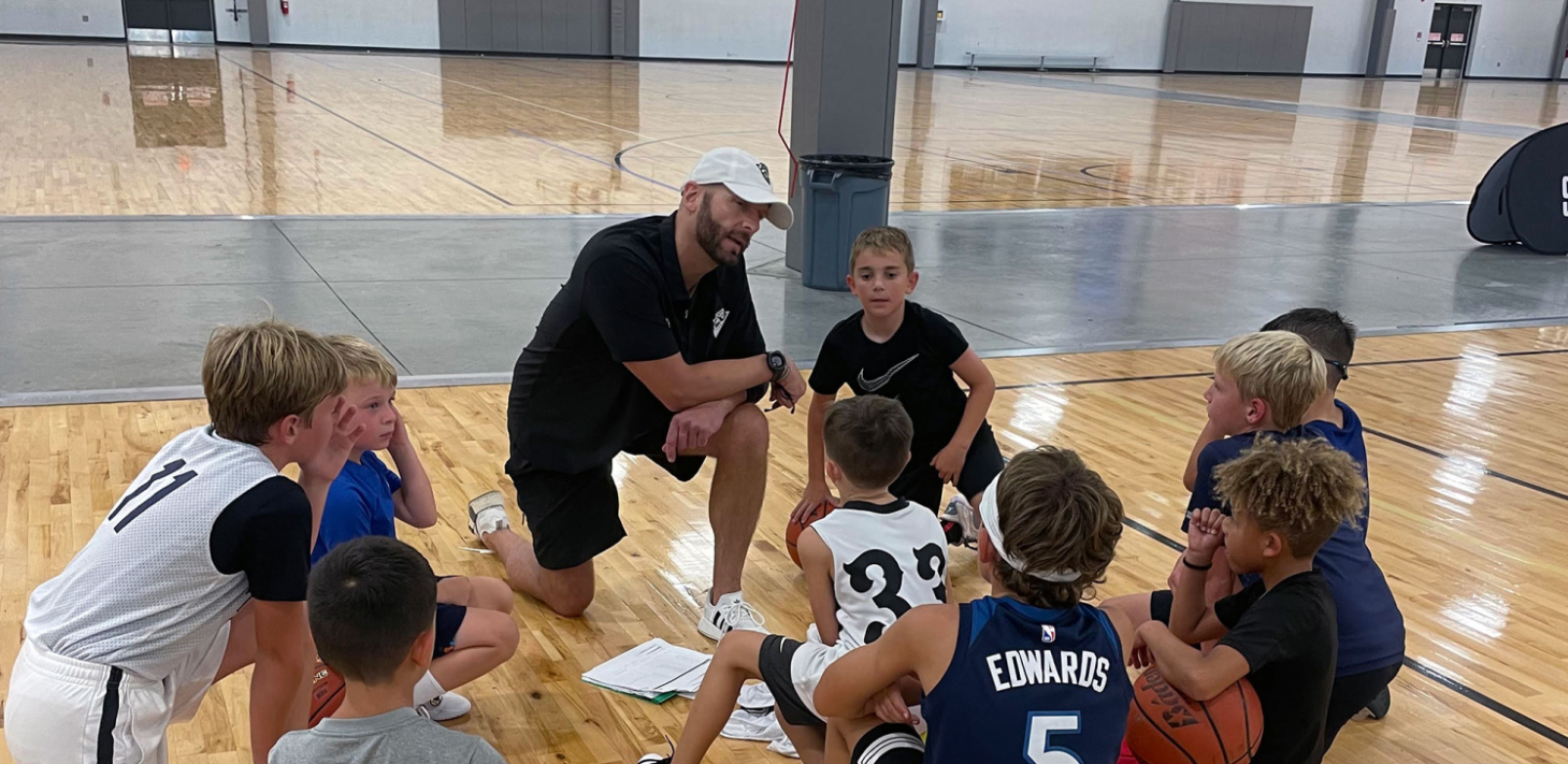 Coach Talking to Players